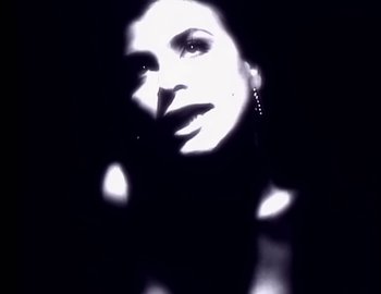 Movie still from “Paula Abdul - Straight Up” (1988), directed by David Fincher – Extreme Close Up shot, Low angle