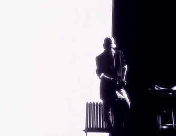 Movie still from “Paula Abdul - Straight Up” (1988), directed by David Fincher – Wide shot, Low angle