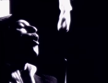 Movie still from “Paula Abdul - Straight Up” (1988), directed by David Fincher – Extreme Close Up shot, Low angle