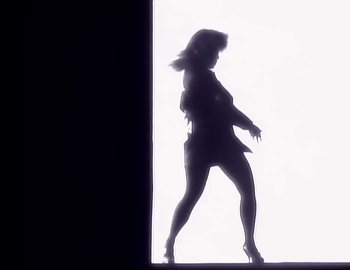 Movie still from “Paula Abdul - Straight Up” (1988), directed by David Fincher – Medium shot, Low angle