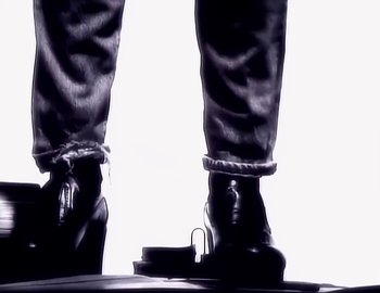 Movie still from “Paula Abdul - Straight Up” (1988), directed by David Fincher – Extreme Close Up shot, Low angle