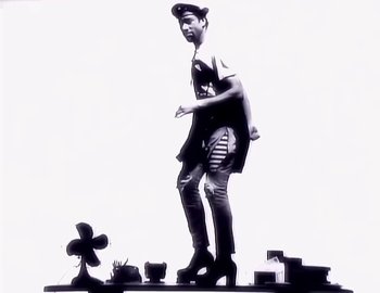 Movie still from “Paula Abdul - Straight Up” (1988), directed by David Fincher – Medium shot, Low angle