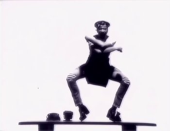 Movie still from “Paula Abdul - Straight Up” (1988), directed by David Fincher – Medium shot, Low angle