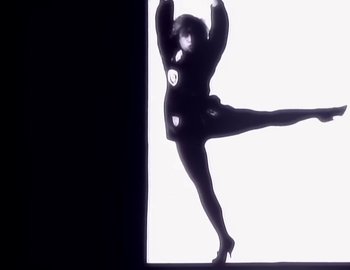 Movie still from “Paula Abdul - Straight Up” (1988), directed by David Fincher – Wide shot, Low angle