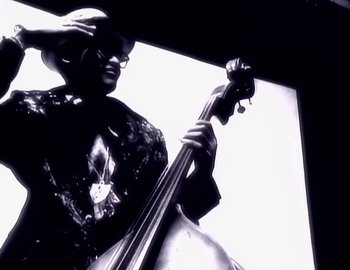 Movie still from “Paula Abdul - Straight Up” (1988), directed by David Fincher – Extreme Close Up shot, Low angle