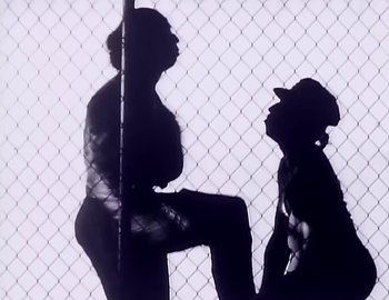 Movie still from “Paula Abdul - Straight Up” (1988), directed by David Fincher – Medium shot, Low angle