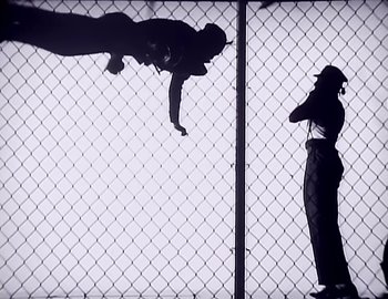 Movie still from “Paula Abdul - Straight Up” (1988), directed by David Fincher – Wide shot, Low angle