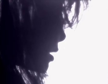 Movie still from “Paula Abdul - Straight Up” (1988), directed by David Fincher – Extreme Close Up shot, Low angle