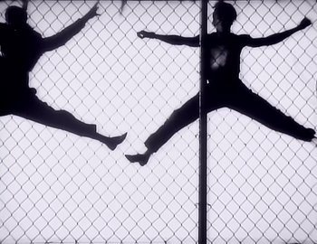 Movie still from “Paula Abdul - Straight Up” (1988), directed by David Fincher – Wide shot, Low angle