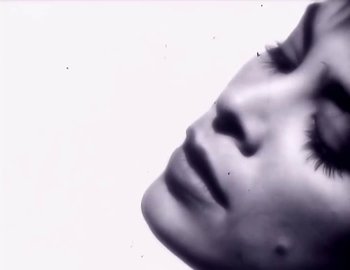 Movie still from “Paula Abdul - Straight Up” (1988), directed by David Fincher – Extreme Close Up shot, Low angle