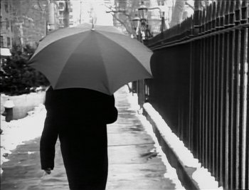 Movie still from “Sting - Englishman In New York” (1988), directed by David Fincher – Medium shot, Low angle