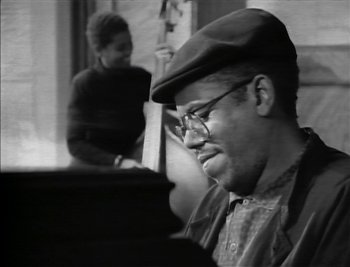 Movie still from “Sting - Englishman In New York” (1988), directed by David Fincher – Close Up shot, Low angle