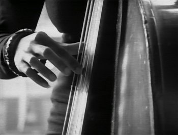 Movie still from “Sting - Englishman In New York” (1988), directed by David Fincher – Extreme Close Up shot, Low angle