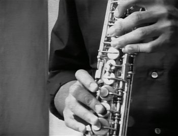 Movie still from “Sting - Englishman In New York” (1988), directed by David Fincher – Extreme Close Up shot, Low angle