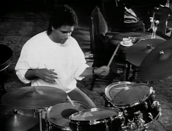 Movie still from “Sting - Englishman In New York” (1988), directed by David Fincher – Medium shot, Low angle