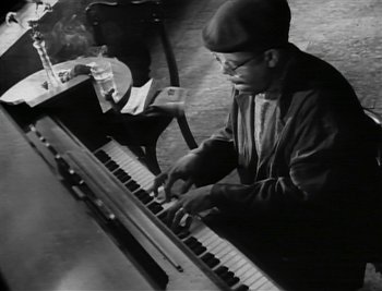 Movie still from “Sting - Englishman In New York” (1988), directed by David Fincher – Close Up shot, High angle