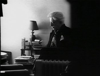 Movie still from “Sting - Englishman In New York” (1988), directed by David Fincher – Medium shot, Low angle