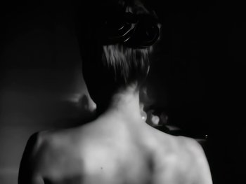 Movie still from “Foreigner - Say You Will” (1987), directed by David Fincher – Extreme Close Up shot, Low angle