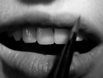 Movie still from “Foreigner - Say You Will” (1987), directed by David Fincher – Extreme Close Up shot, Low angle