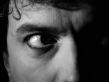 Movie still from “Foreigner - Say You Will” (1987), directed by David Fincher – Extreme Close Up shot, Low angle