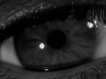 Movie still from “Foreigner - Say You Will” (1987), directed by David Fincher – Extreme Close Up shot, Overhead angle