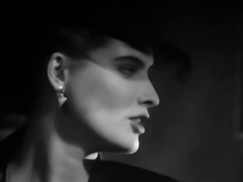 Movie still from “Foreigner - Say You Will” (1987), directed by David Fincher – Extreme Close Up shot, Low angle