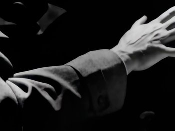 Movie still from “Foreigner - Say You Will” (1987), directed by David Fincher – Extreme Close Up shot, Low angle