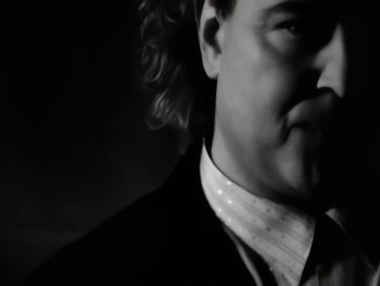 Movie still from “Foreigner - Say You Will” (1987), directed by David Fincher – Extreme Close Up shot, Low angle