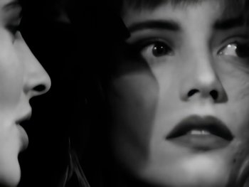 Movie still from “Foreigner - Say You Will” (1987), directed by David Fincher – Extreme Close Up shot, Low angle