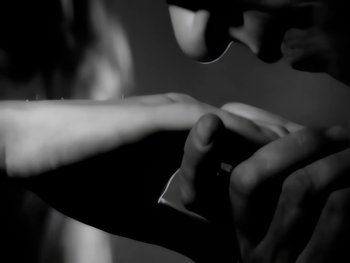 Movie still from “Foreigner - Say You Will” (1987), directed by David Fincher – Extreme Close Up shot, Low angle