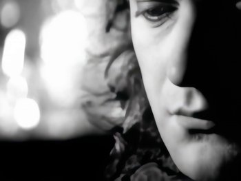 Movie still from “Foreigner - Say You Will” (1987), directed by David Fincher – Extreme Close Up shot, Low angle