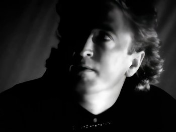 Movie still from “Foreigner - Say You Will” (1987), directed by David Fincher – Close Up shot, Low angle