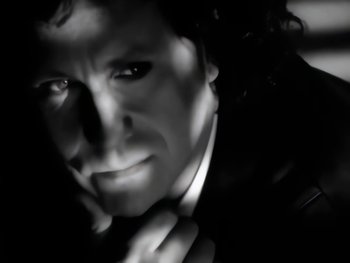 Movie still from “Foreigner - Say You Will” (1987), directed by David Fincher – Extreme Close Up shot, High angle