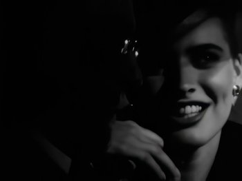 Movie still from “Foreigner - Say You Will” (1987), directed by David Fincher – Extreme Close Up shot, Low angle