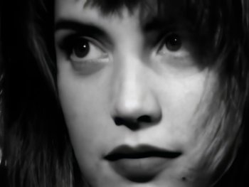 Movie still from “Foreigner - Say You Will” (1987), directed by David Fincher – Extreme Close Up shot, Low angle