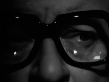 Movie still from “Foreigner - Say You Will” (1987), directed by David Fincher – Extreme Close Up shot, Low angle