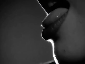 Movie still from “Foreigner - Say You Will” (1987), directed by David Fincher – Extreme Close Up shot, Low angle