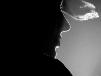 Movie still from “Foreigner - Say You Will” (1987), directed by David Fincher – Extreme Close Up shot, Low angle