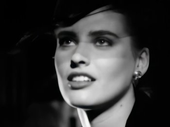 Movie still from “Foreigner - Say You Will” (1987), directed by David Fincher – Close Up shot, Low angle