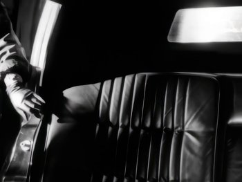 Movie still from “Foreigner - Say You Will” (1987), directed by David Fincher – Extreme Close Up shot, Low angle