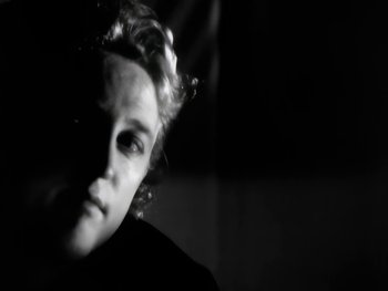 Movie still from “Foreigner - Say You Will” (1987), directed by David Fincher – Extreme Close Up shot, Low angle