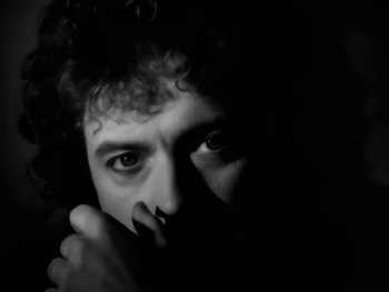 Movie still from “Foreigner - Say You Will” (1987), directed by David Fincher – Extreme Close Up shot, Low angle