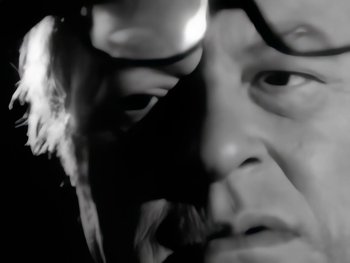 Movie still from “Foreigner - Say You Will” (1987), directed by David Fincher – Extreme Close Up shot, Low angle