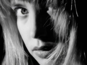 Movie still from “Foreigner - Say You Will” (1987), directed by David Fincher – Extreme Close Up shot, Low angle