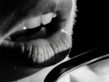 Movie still from “Foreigner - Say You Will” (1987), directed by David Fincher – Extreme Close Up shot, Low angle