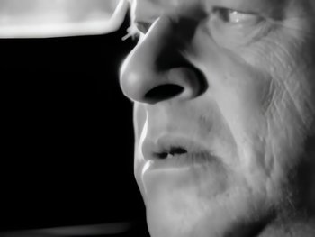 Movie still from “Foreigner - Say You Will” (1987), directed by David Fincher – Extreme Close Up shot, Low angle