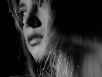 Movie still from “Foreigner - Say You Will” (1987), directed by David Fincher – Extreme Close Up shot, Low angle