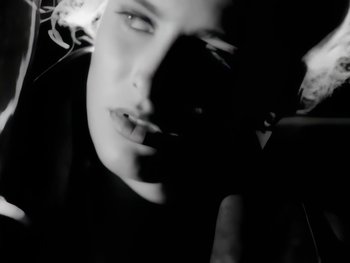 Movie still from “Foreigner - Say You Will” (1987), directed by David Fincher – Extreme Close Up shot, Low angle