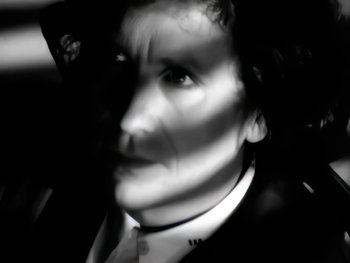 Movie still from “Foreigner - Say You Will” (1987), directed by David Fincher – Extreme Close Up shot, High angle