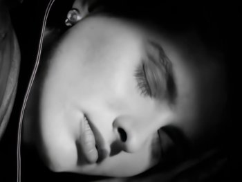 Movie still from “Foreigner - Say You Will” (1987), directed by David Fincher – Extreme Close Up shot, Low angle